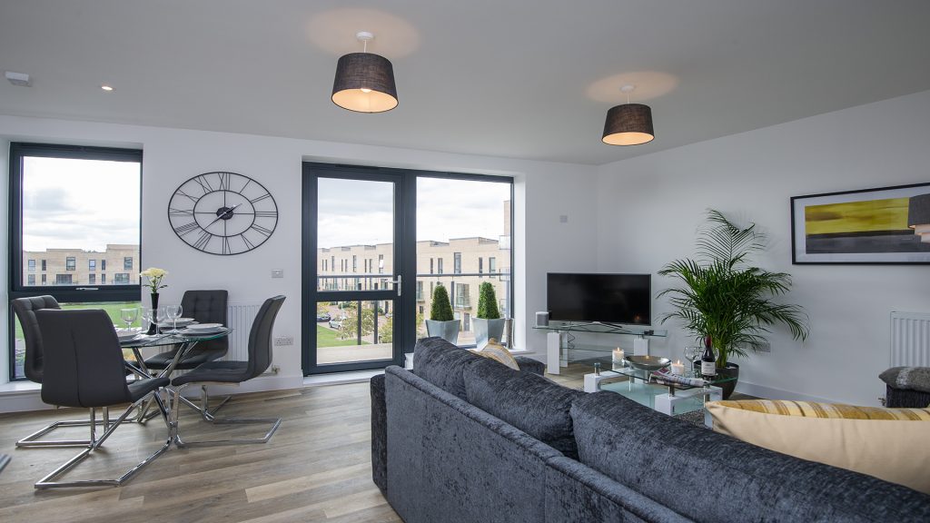 Tailored Stays De Havilland House sofa and reception area Serviced apartment Cambridge